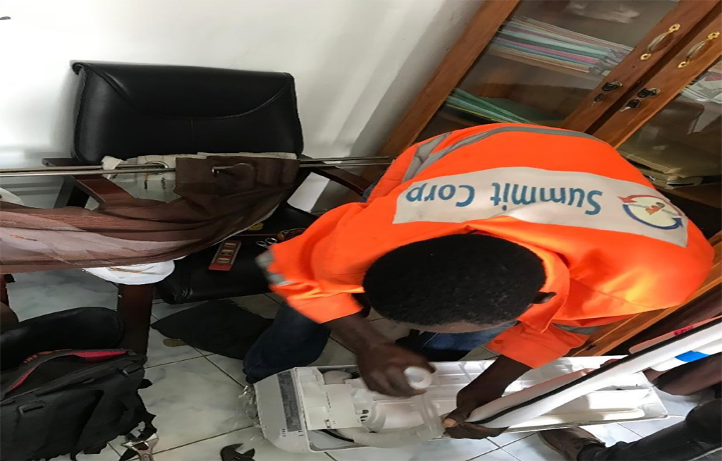 Technician_summit_corp_performing_maintenance
